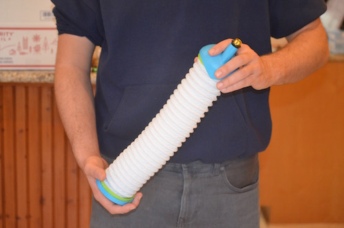 holding-bukket-gravity-bong-in-hand