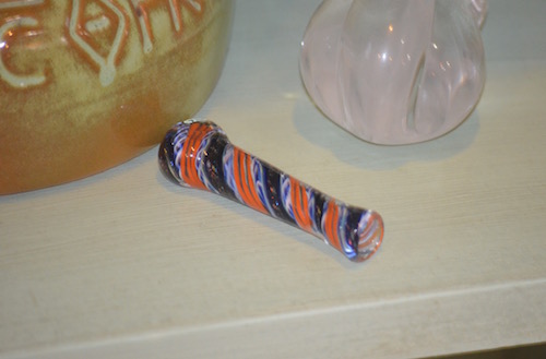 Clay, Glass, Wood One Hitters chillum-herb-pipe-on-counter