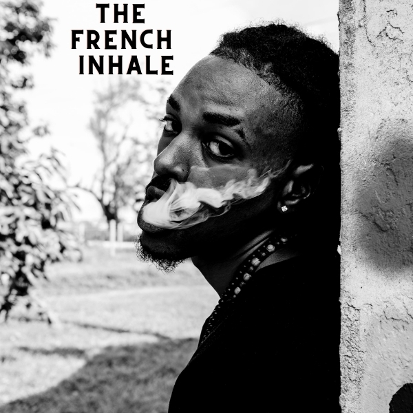 Man performing a french inhale to perrfection